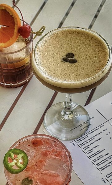 An espresso martini, an old fashioned and a spicy margarita